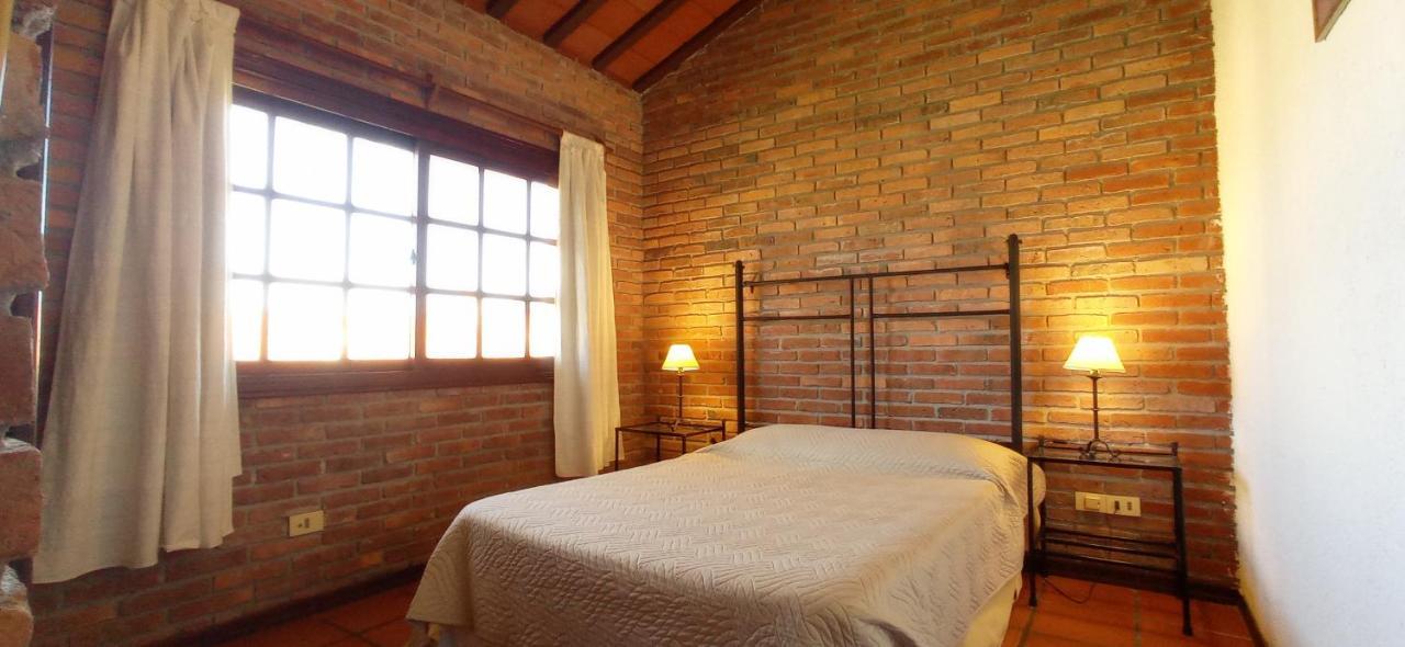 Aparthotel Pino Dorado Manantiales Esterno foto